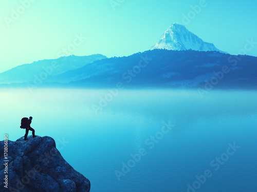 Young man up the mountain