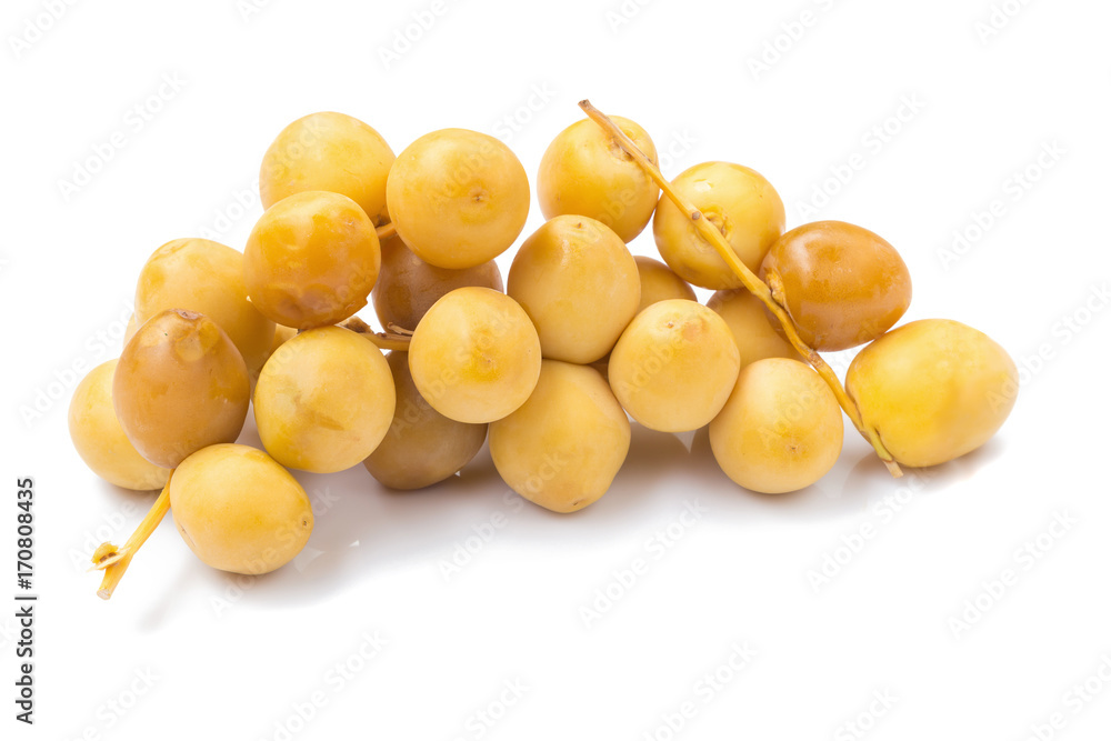 yellow raw dates isolated on white background yellow raw dates isolated on white background