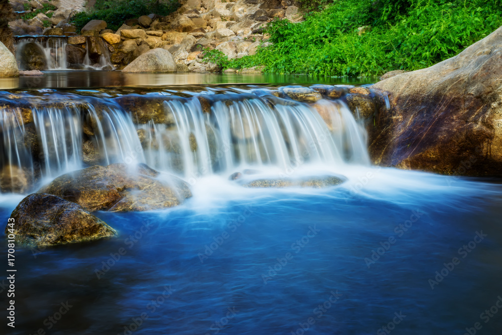 Obraz premium Small waterfall with water motion.