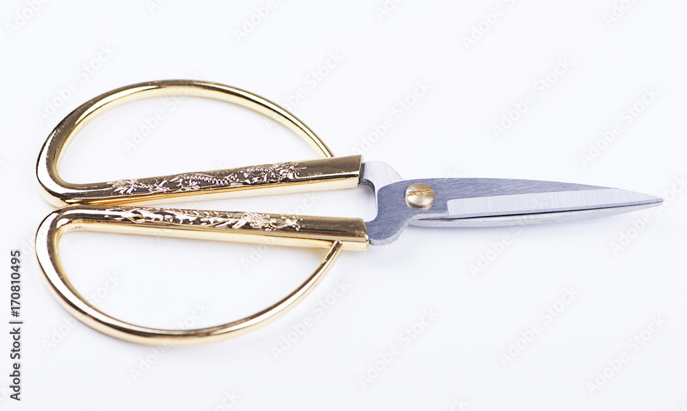 Sewing scissors on white background. Isolated. Sewing scissors on white background. Isolated.