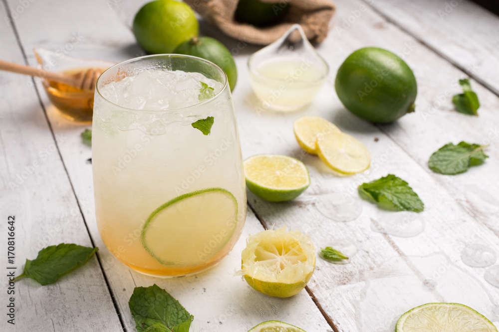 healthy lemonade lime with mint and ice in a glass healthy lemonade lime with mint and ice in a glass