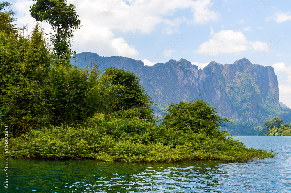 Beautiful mountains lake river sky and natural attractions in Ratchaprapha Dam at Khao Sok National Park, Surat Thani Province, Thailand