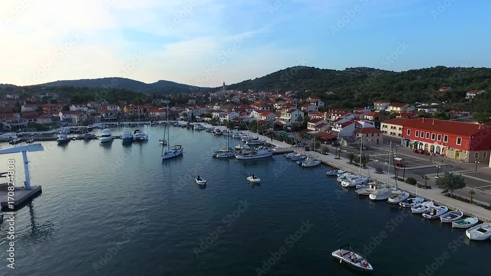 Aerial view of marina in a small Croatian town on sunset, 2K7 video. Aerial view of marina in a small Croatian town on sunset, 2K7 video.