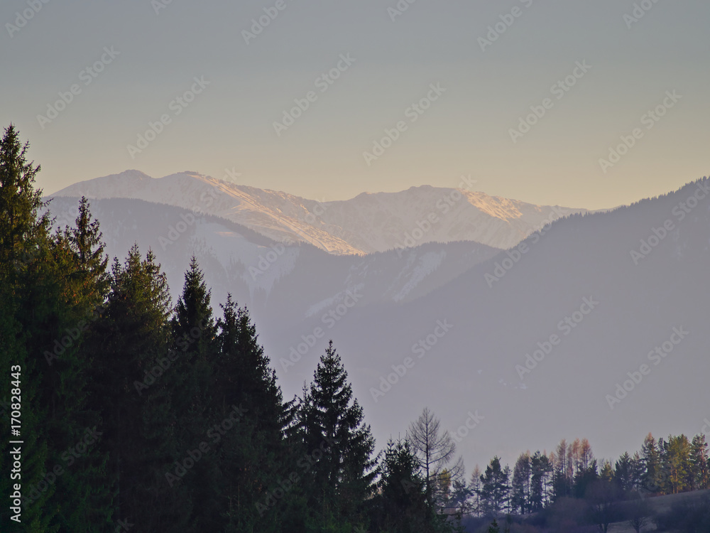 Beautiful view over valley with fields and forest. Tatra mountains, Slovakia.