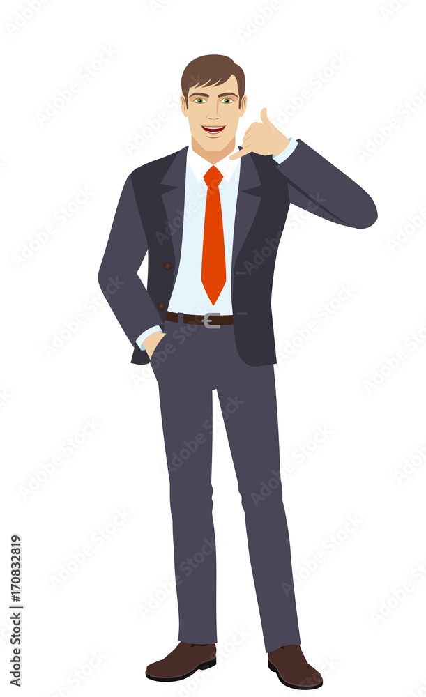 Businessman with hand in pocket showing a call me sign Businessman with hand in pocket showing a call me sign