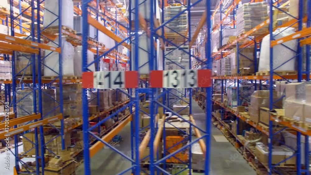 Camera in motion inside a large warehouse, storage. 4K. Camera in motion inside a large warehouse, storage. 4K.