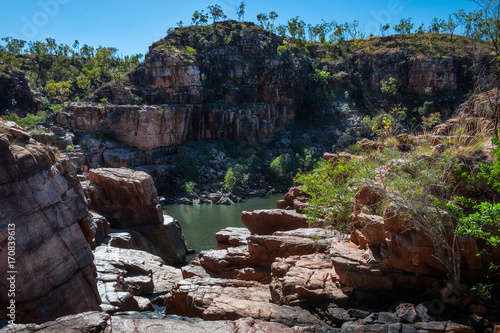 River and escarpment at Katherine Gorge on a beautiful sunny day in Nitmiluk National Park, Northern Territory, Australia.