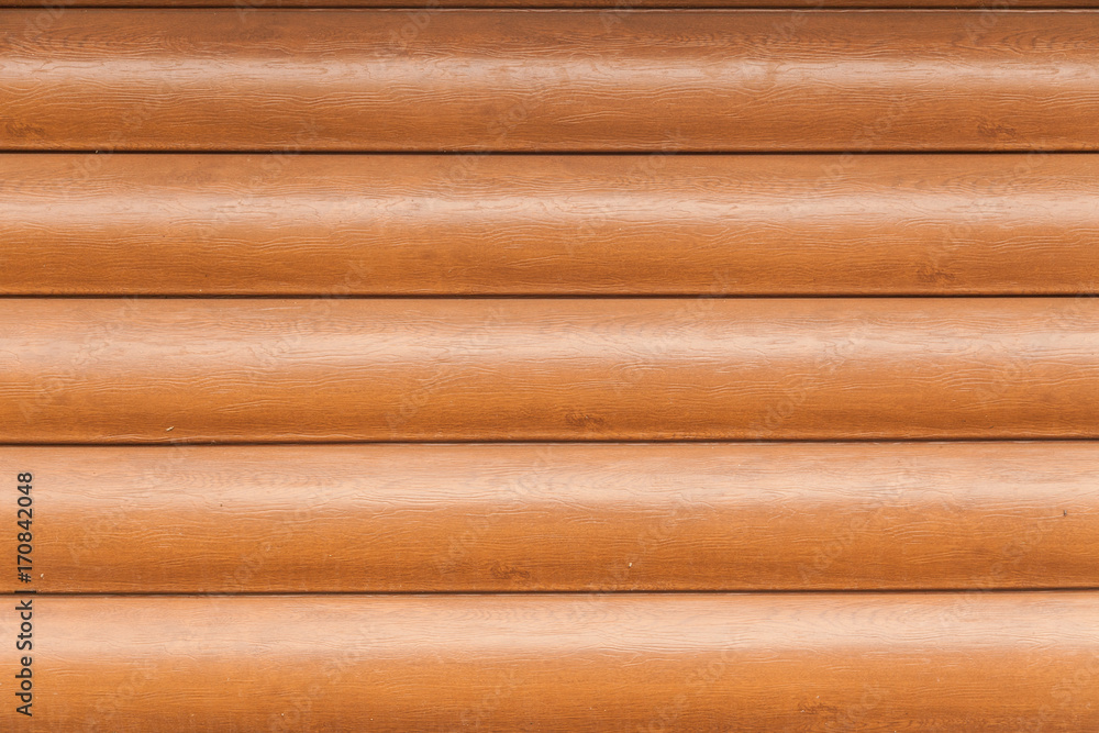 Wall of a plastic siding log house wall with texture and wood pattern simulation knots exterior Wall of a plastic siding log house wall with texture and wood pattern simulation knots exterior