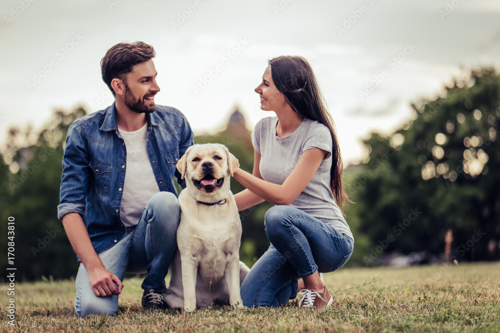 Obraz premium Couple with dog