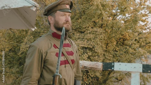 Soviet soldier with the bayonet is on guard photo