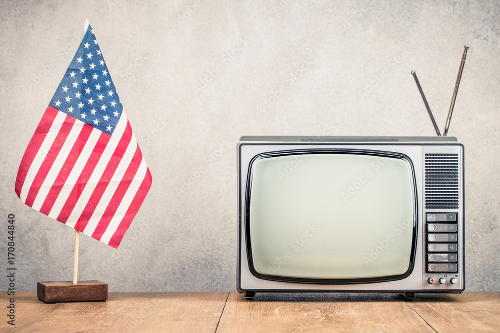 USA flag and retro TV set front old concrete wall background. Vintage  instagram style filtered photo Stock Photo | Adobe Stock