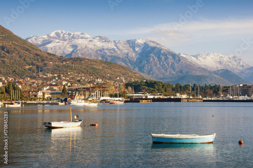 View of the snow-covered mountain Lovcen from the Bay of Kotor. Tivat town  Montenegro