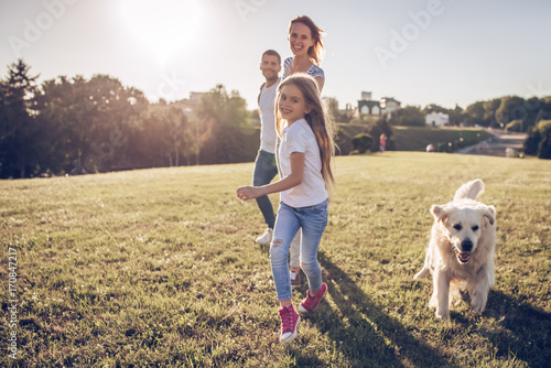 Photography Happy family with dog