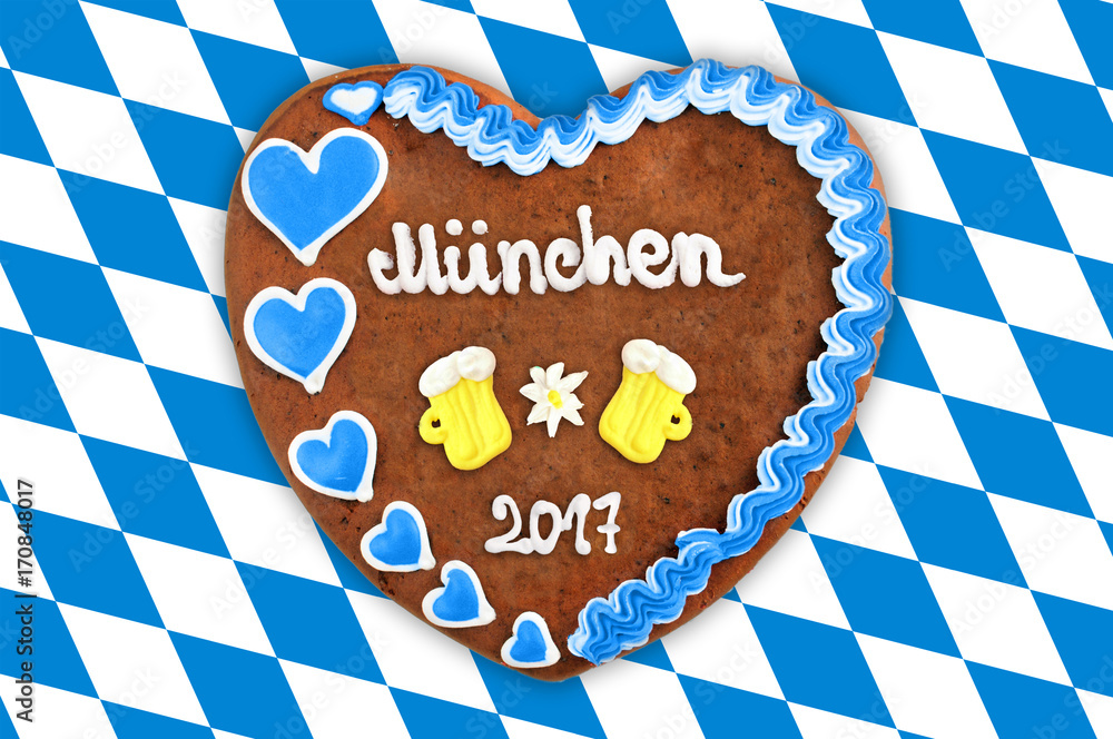 Obraz premium Oktoberfest Gingerbread heart 2017 on white blue bavarian flag background
