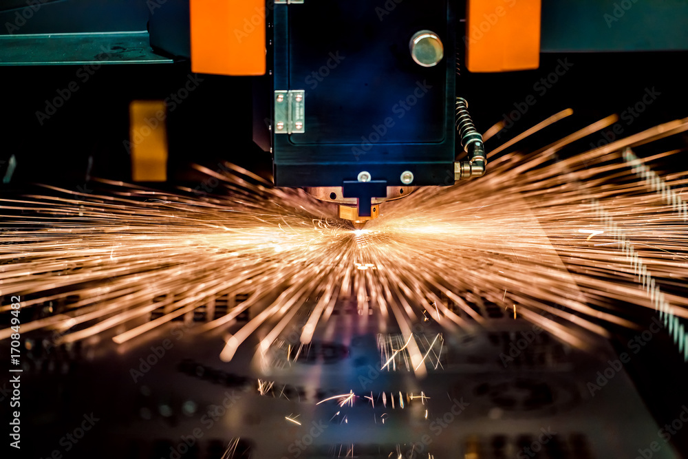 CNC Laser cutting of metal, modern industrial technology. CNC Laser cutting of metal, modern industrial technology.
