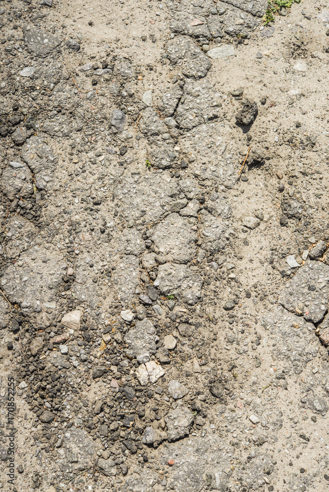 Road with pieces of asphalt Road with pieces of asphalt