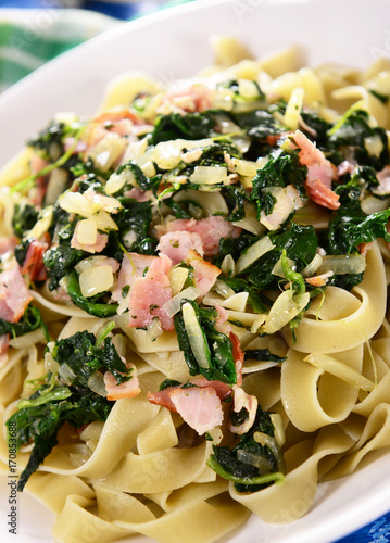 Tagiatelle pasta with spinach and ham