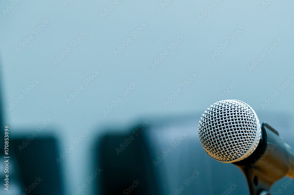 Close-up of microphone in concert hall or conference room Close-up of microphone in concert hall or conference room