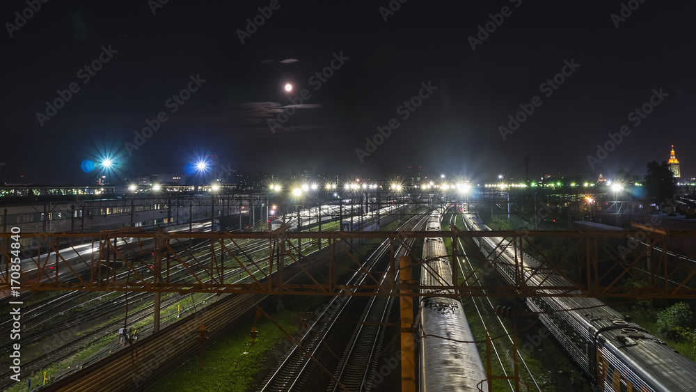  night movement of trains on a railway junction in moon light