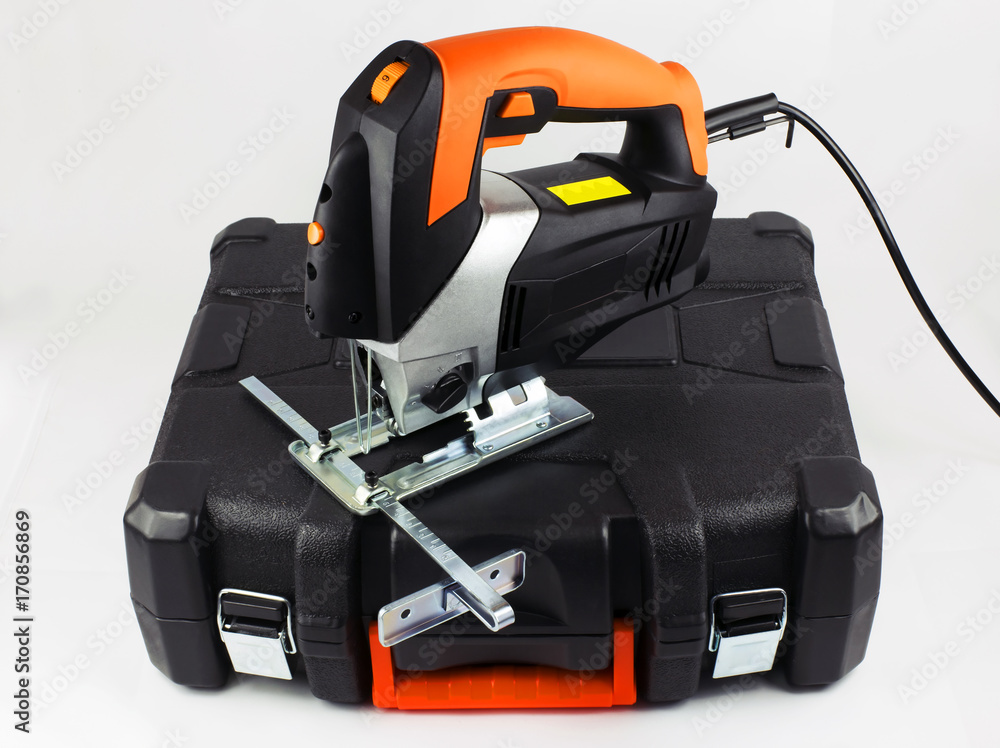 Electric jig saw on the light background Electric jig saw on the light background