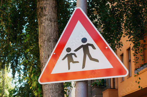 red predestrians attention traffic sign