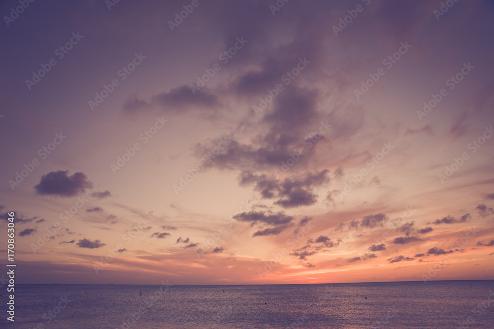 Beautiful beach sea and sunset scene with vintage tone