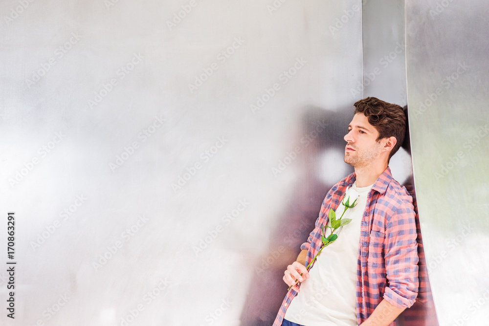 Obraz premium Young American Man missing you, waiting for you outside in New York