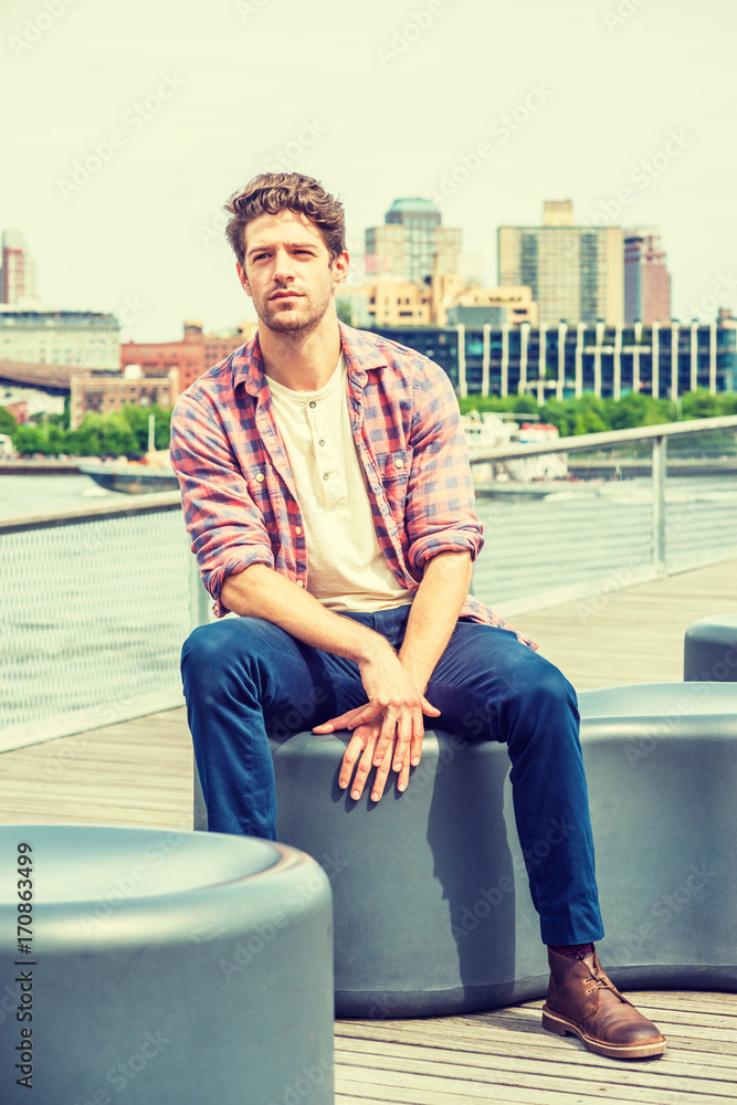 Fototapeta premium Young American man traveling, relaxing in New York