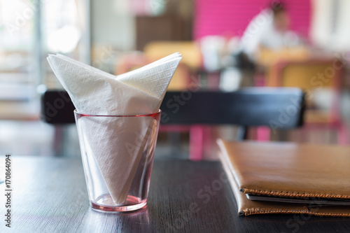 Paper Napkins in Pink Clear Glass on Table in Restaurant
