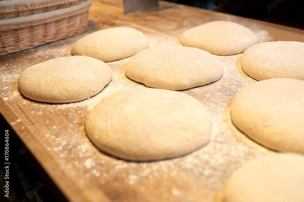 yeast bread dough on bakery kitchen table yeast bread dough on bakery kitchen table