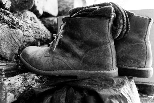 Farmer's Work Boots on Firewood