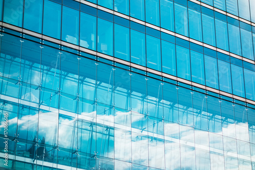 sky reflections in glass facade