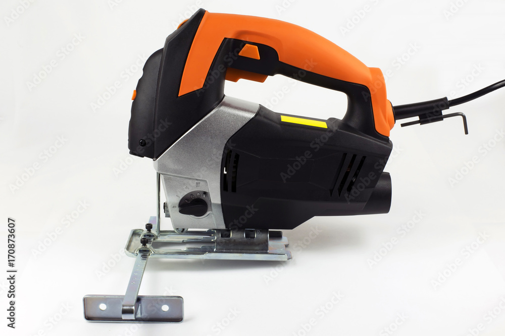 Electric jig saw on the light background Electric jig saw on the light background