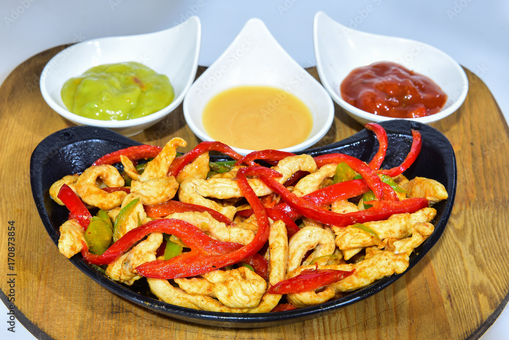 fried chicken and menu with a variety of condiments fried chicken and menu with a variety of condiments