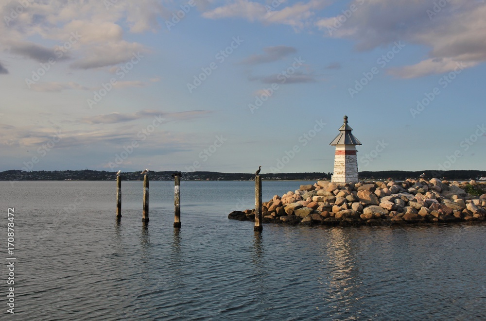 Small lighthouse in the harbour of Ebeltoft, Denmark.