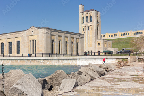 woman walking near  RC Harris water treatment plant in Toronto Ontario