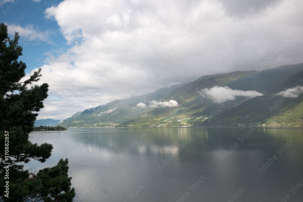 Clouds and water view on the narrowest fjord in Norway