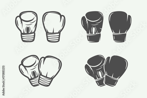 Set of vintage boxing gloves in retro style. Vector illustration. Monochrome Graphic Art.