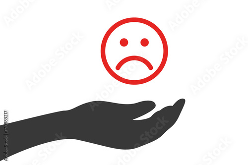 Hand hält unglücklichen Smiley