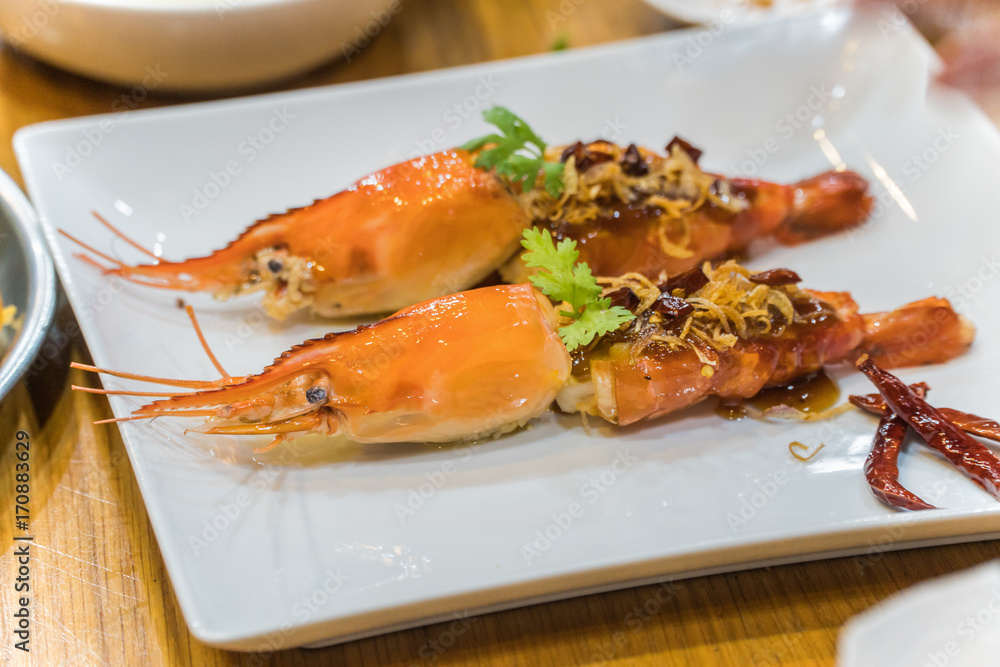 Deep fried prawns in tamarind sauce with herb Deep fried prawns in tamarind sauce with herb