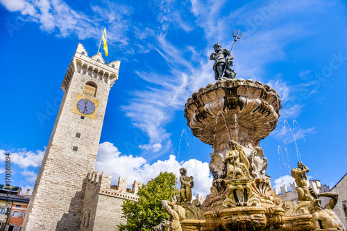 фотография Fontana del Nettuno (Neptune fountain) in Trento and the Torre Civica or Torre d