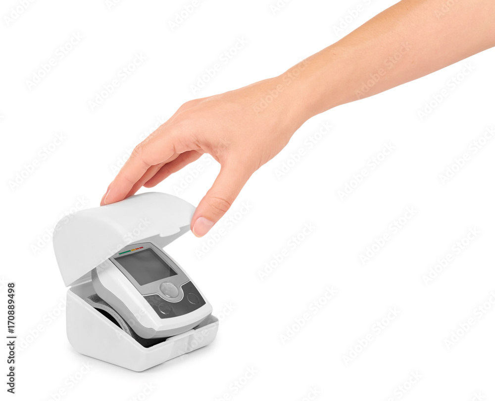 blood pressure measurement equipment tensiometer in hand isolated on white background blood pressure measurement equipment tensiometer in hand isolated on white background