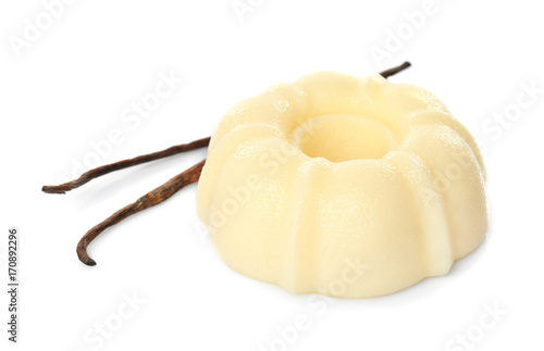 Delicious vanilla pudding on white background photo