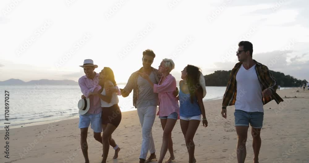 People Walking On Beach Talking At Sunset, Cheerful Men And Women Group Happy Smiling Tourists Communication On Summer Holiday Slow Motion 60 People Walking On Beach Talking At Sunset, Cheerful Men And Women Group Happy Smiling Tourists Communication On Summer Holiday Slow Motion 60