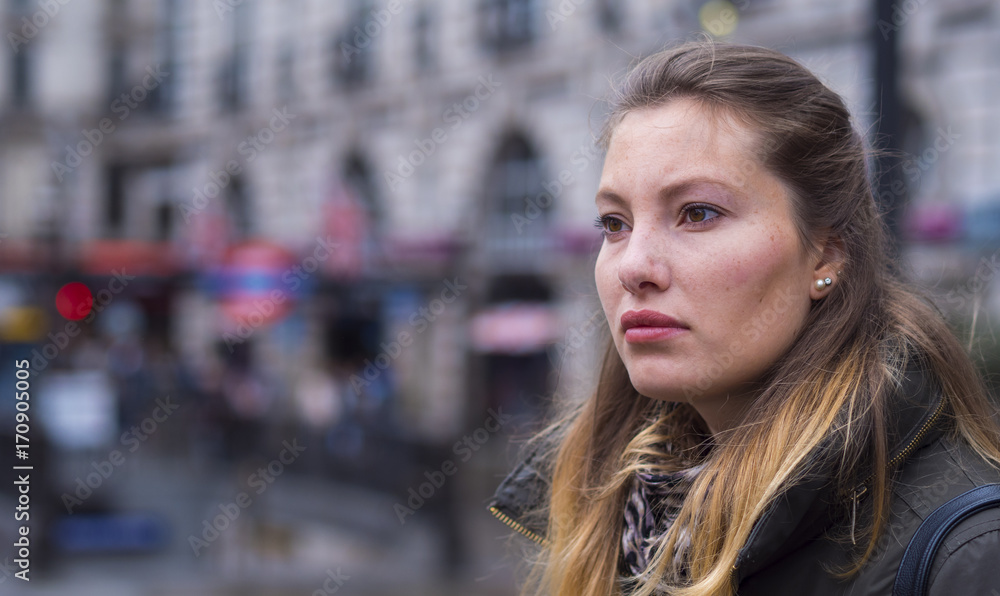 Portrait of a young blonde woman in a big city Portrait of a young blonde woman in a big city