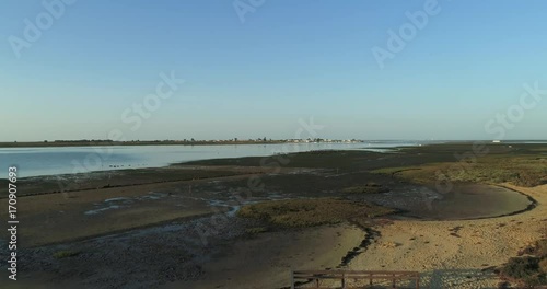 Aerial seascape, in Ria Formosa wetlands natural park, Cavacos Beach Footpath. Algarve.