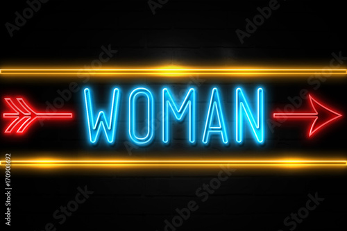 Woman - fluorescent Neon Sign on brickwall Front view