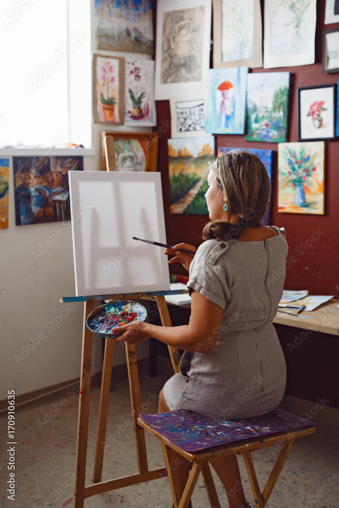 Young Caucasian People In An Art Gallery Looking At Paintings And Talking  About Them Stock Photo, Picture and Royalty Free Image. Image 22573792.