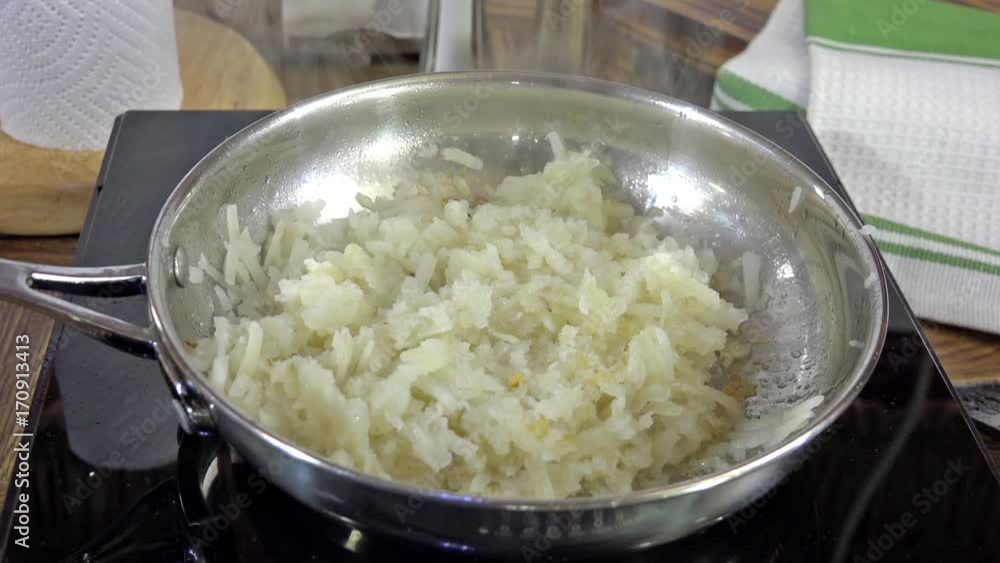 Grinding pepper onto hash browns