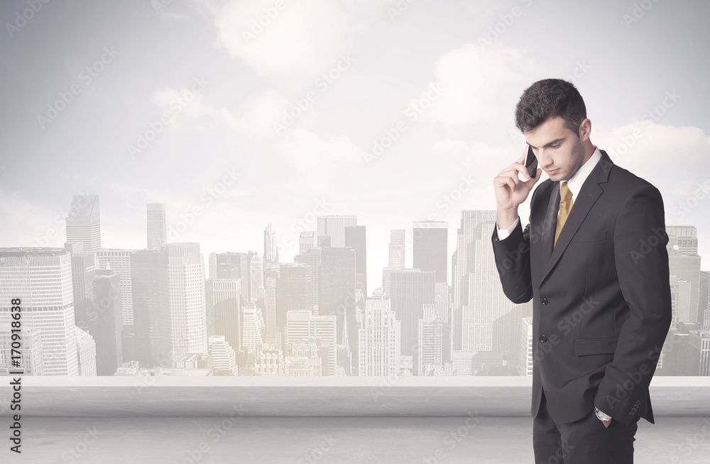 Sales person talking in front of city scape Sales person talking in front of city scape